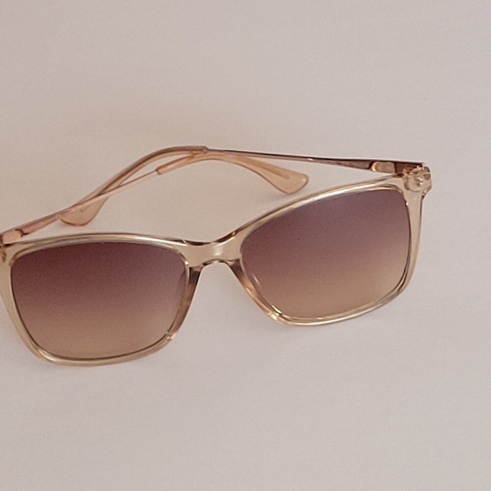 Calvin Klein CK20708S 270 sunglasses 55x16x140  light brown crystal frame